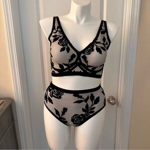 *New with Tags*. Eby bra and panty set. Eby Noir bra and panty. Size XL.